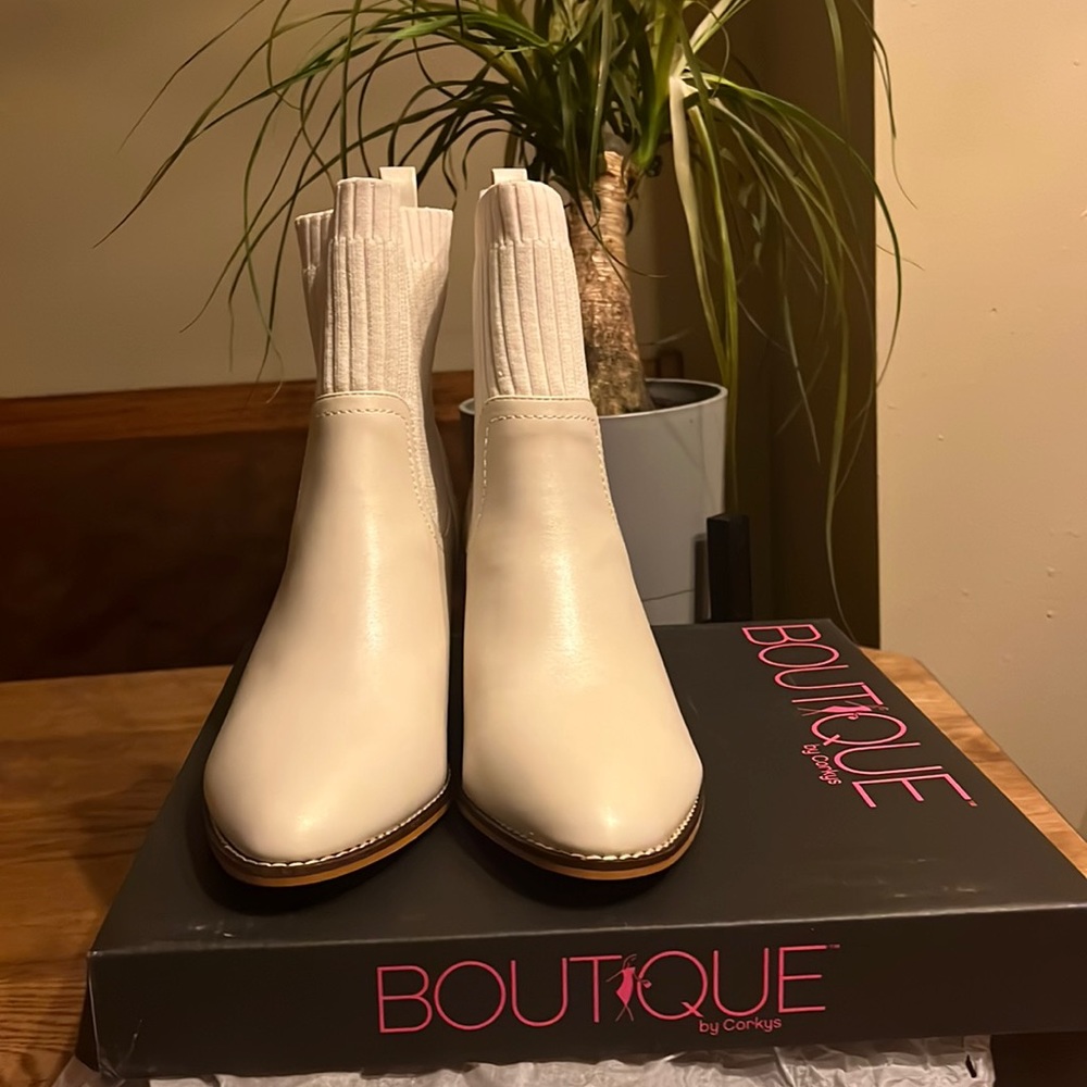 Brand new corky ivory boots with sweater stretch on top